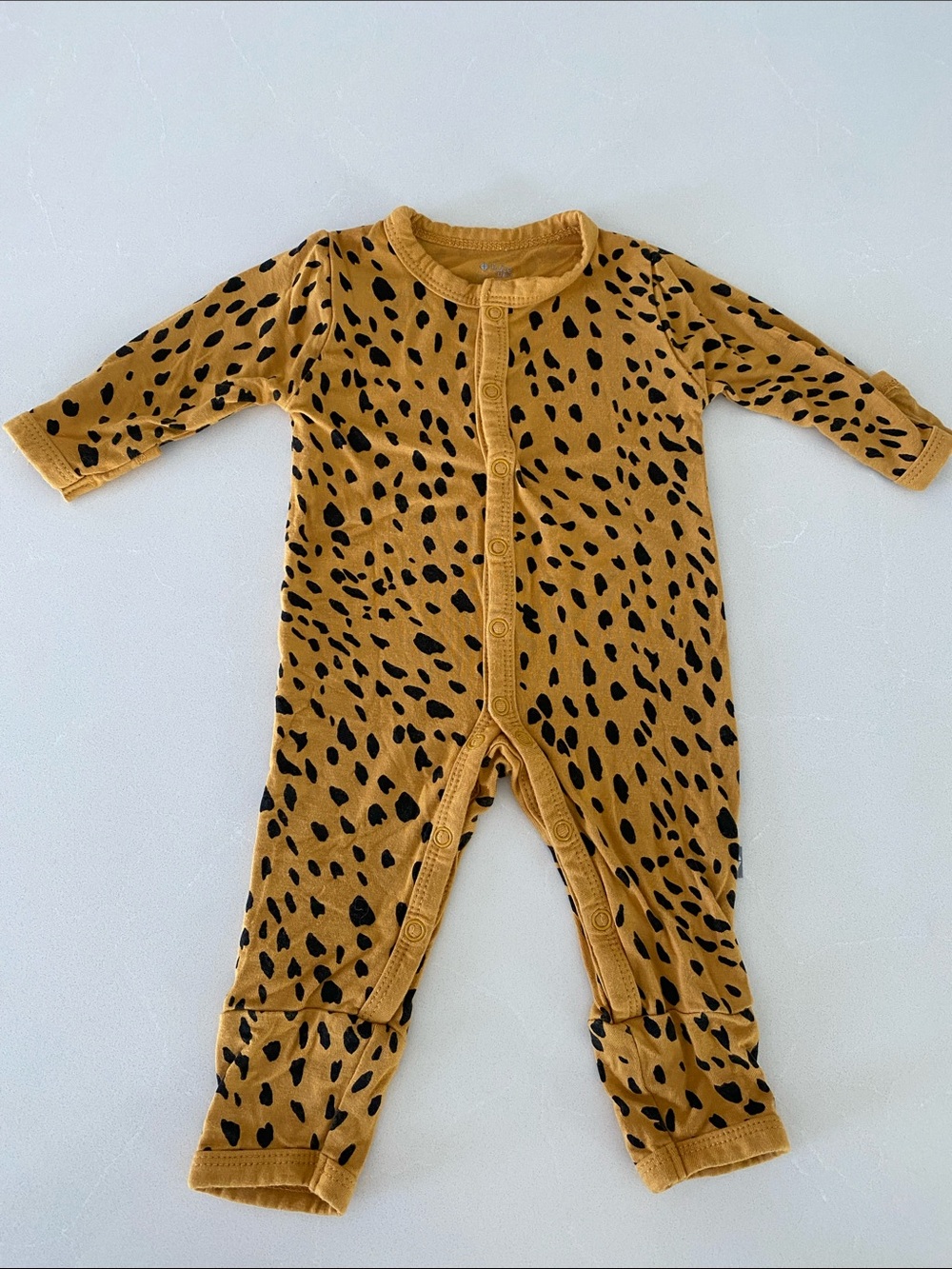 Kyte Long Sleeve One-Piece in Mustard with Black Spot Print